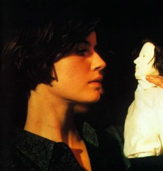 Irene Jacob in Double Life of Veronique, gazing at the puppet - of herself - that Alexandre Fabbri has created. (http://images.google.com/imgres?imgurl=http://www.moviemail-online.co.uk/images/)</